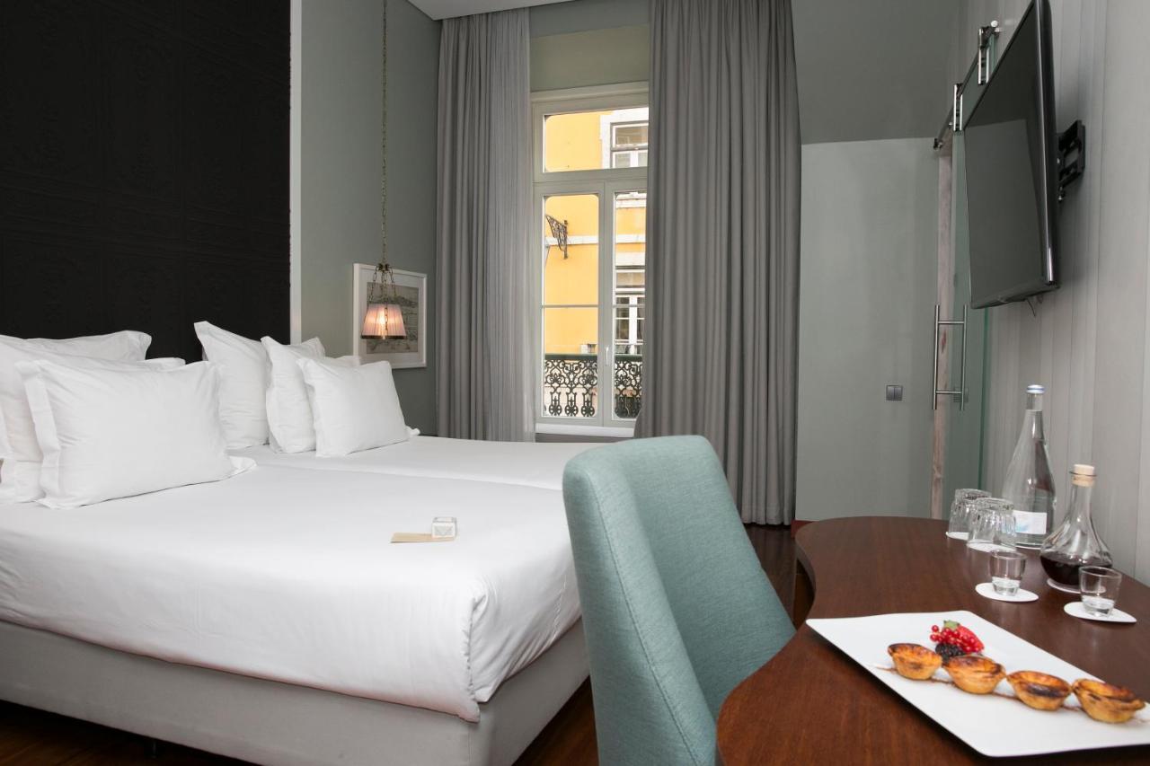 بوسادا دي لشبونة - الفنادق الصغيرة الفاخرة في العالم Lisboa المظهر الخارجي الصورة A room at the hotel