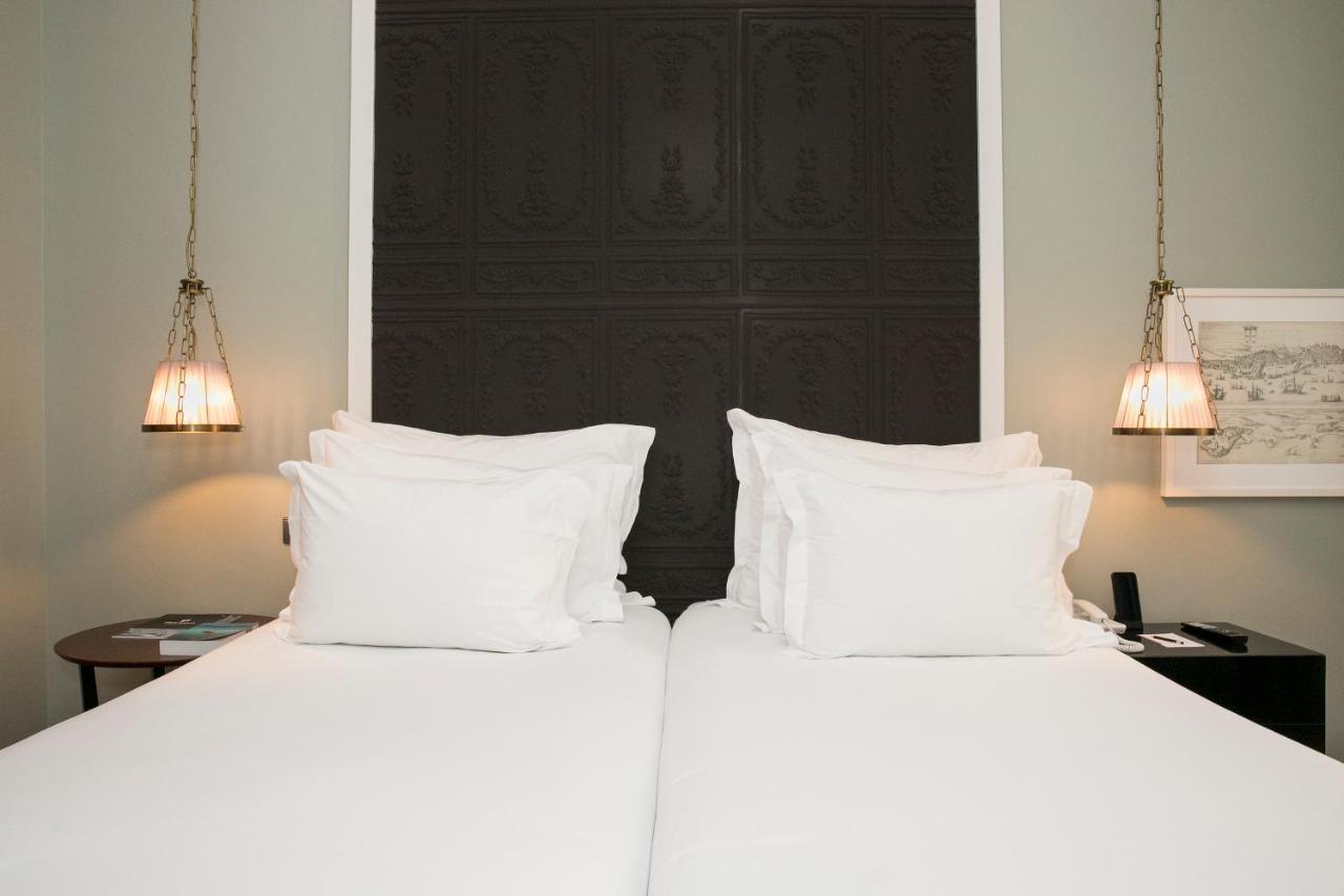 بوسادا دي لشبونة - الفنادق الصغيرة الفاخرة في العالم Lisboa المظهر الخارجي الصورة A bed with two pillows